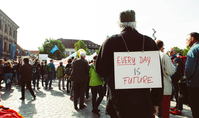 When Your Country Changes Face: Disidentification Amidst National Ideological Shifts and Political Polarization
